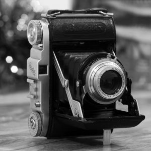 Black and white photograph showing 1950's Balda Baldix medium format film camera. Photographer Darron Barnes - Milly's Cameras Repair Materials