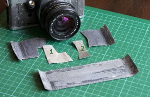 Removed-old-camera-skins-from-a-Praktica-MTL-3-film-camera Removed old camera skins from a Praktica MTL 3 film camera