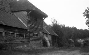 A lack and white photograph taken with voigtlander vito 1 film camera. Photograph of front of a barn wickham hampshire area