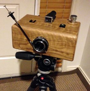 A photograph of the hand made panoramic film camera by Lee Lira