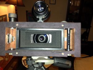 Photograph showing inside the film chamber of the Fac mark II panoramic film camera. Made by Lee Lira.